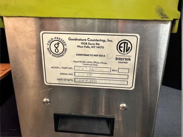 Goodnature CT7 cold press juicer in superb condition, 115V, fully tested. Visible label with serial number and manufacturer details.