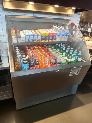 Commercial-grade 36″ wide open air merchandiser, outstanding condition, fully tested and working, stocked with beverages.