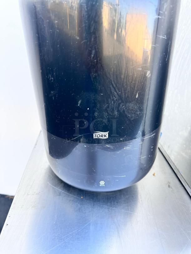 Tork H2 Black Paper Towel Dispenser, wall mountable, commercial grade, superb condition, tested and functional.