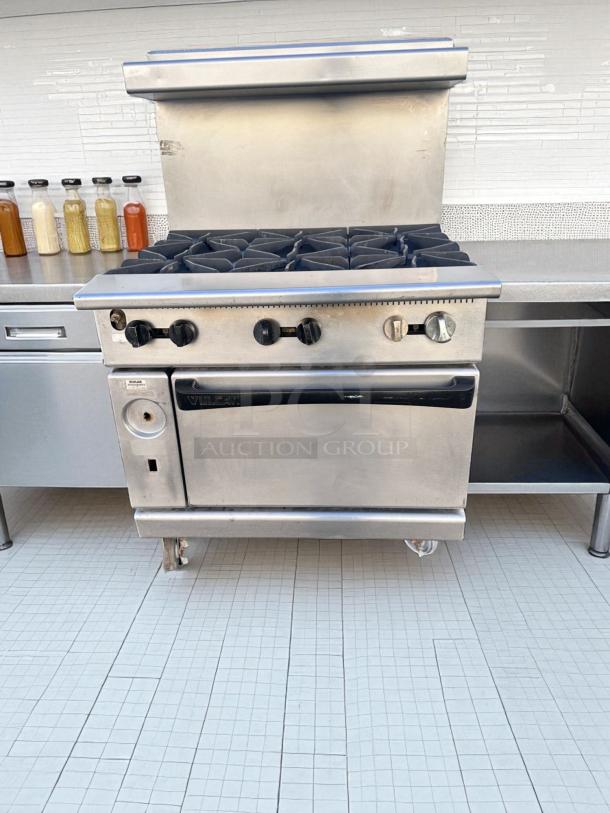 Vulcan V36 gas range, 36" with 6 open burners and standard oven. Superb condition, fully tested, natural gas.