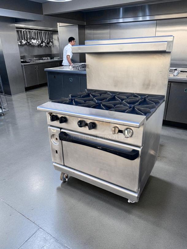 36" Vulcan V36 gas range with 6 open burners and standard oven in superb condition. Natural gas, fully tested and working.