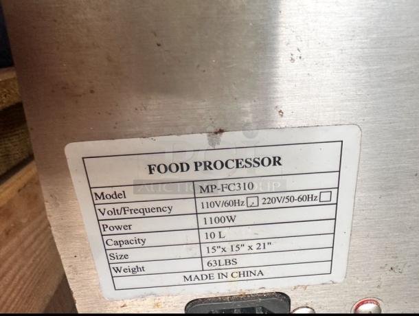 VEVOR MP-FC310 food processor label showing model, voltage, power, capacity, size, and weight details; stainless steel exterior.