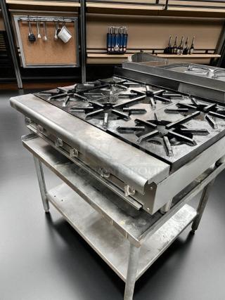 Imperial 24" countertop gas range, model IR-4-C, with 4 open burners, heavy-duty cast iron grates, in excellent condition.