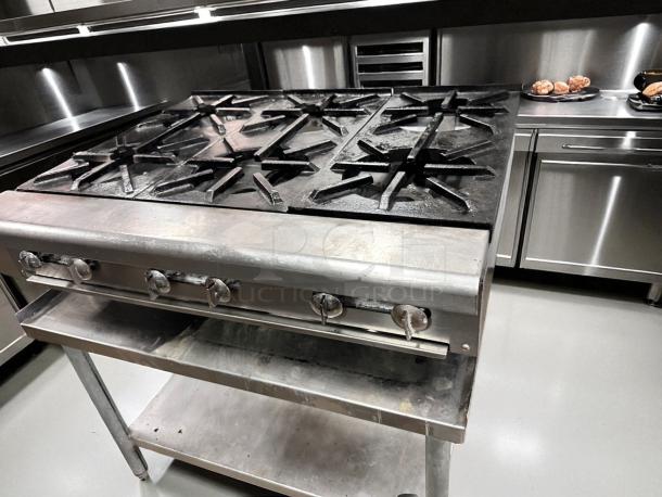 Imperial 24" Gas Range, Model IR-4-C, with 4 open burners, heavy-duty cast iron, excellent condition, fully tested.