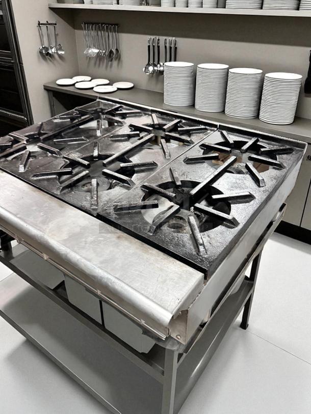 Imperial IR-4-C 24" countertop gas range with 4 open burners, heavy-duty cast iron, excellent condition, fully tested.