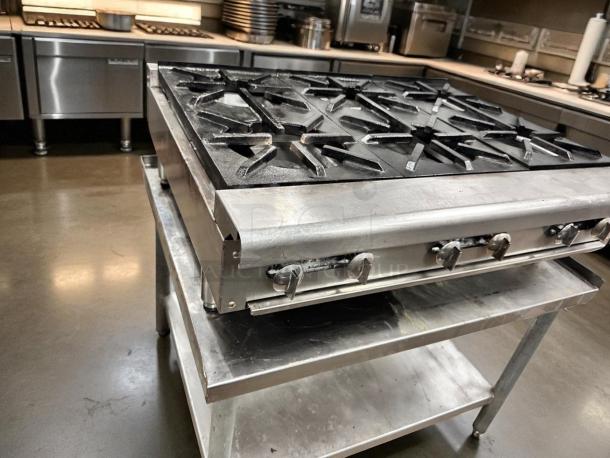 Excellent condition Imperial 24" countertop gas range, model IR-4-C, with 4 open burners, heavy-duty cast iron, fully tested.