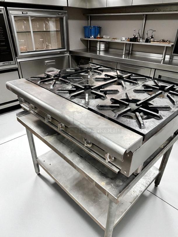 Imperial 24" countertop gas range, model IR-4-C, with 4 open burners, heavy-duty cast iron, excellent condition.