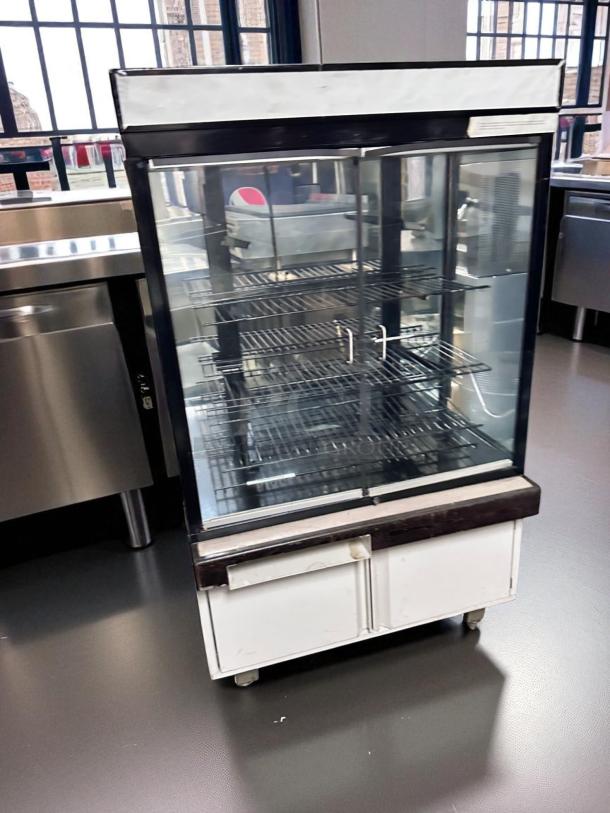 Hussmann DCB-243662 refrigerated merchandiser, 36" display case, pristine condition, fully tested, 115V, glass doors.