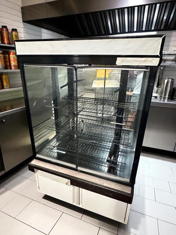 Pristine Hussmann DCB-243662 refrigerated merchandiser, 36" display case, 115V, fully tested, cooling, excellent condition.