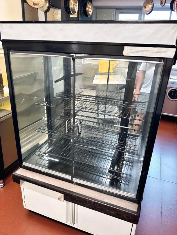 Hussmann DCB-243662 refrigerated merchandiser, pristine condition, 36" display case, 115V, glass doors, fully tested and cooling.