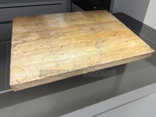 Heavy-duty wood butcher block cutting board, commercial grade, thick, solid condition, visible scratches, fully cleaned.