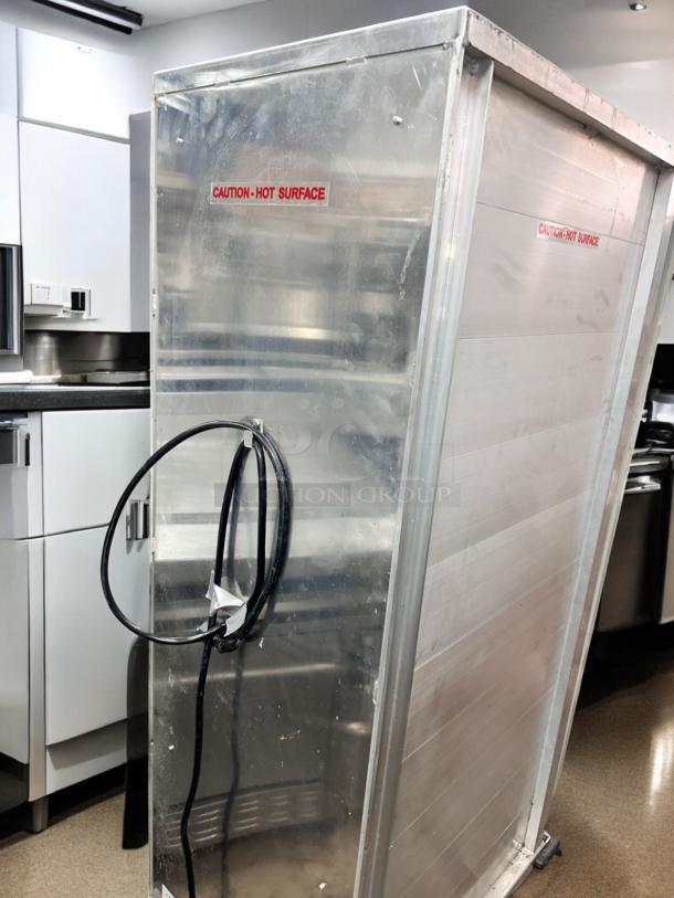 Avantco HEAT1836 mobile heating cabinet in outstanding condition. Features "Caution: Hot Surface" labels. Fully tested, 120V.