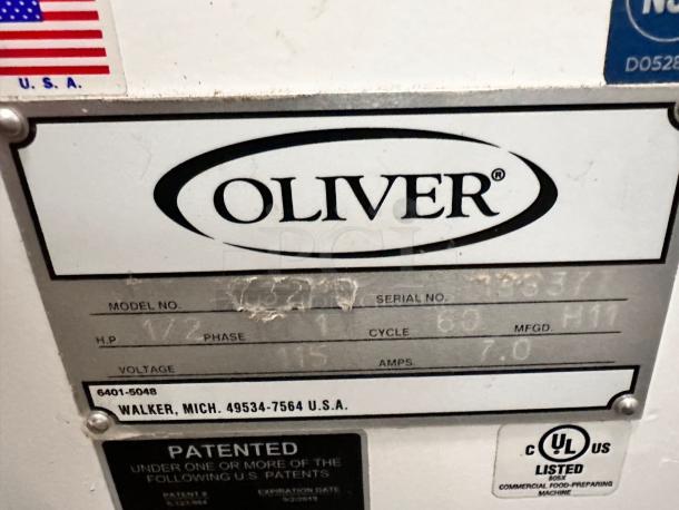 Label of Oliver Model 624 Bread Slicer, 115V, fully tested. Includes serial number, power details, and UL certification.