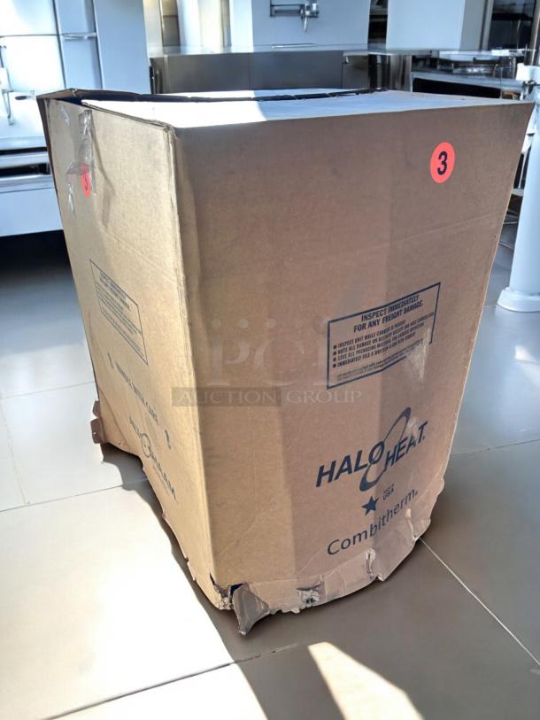 Brand new Alto-Shaam 1000-TH Cook & Hold Oven in sealed box. Box marked with "Halo Heat" and handling instructions.