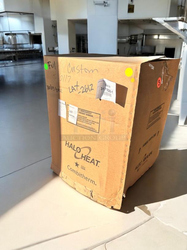 Brand new Alto-Shaam 1000-TH low-temp cook & hold oven, factory sealed in box with labels and handling marks visible.