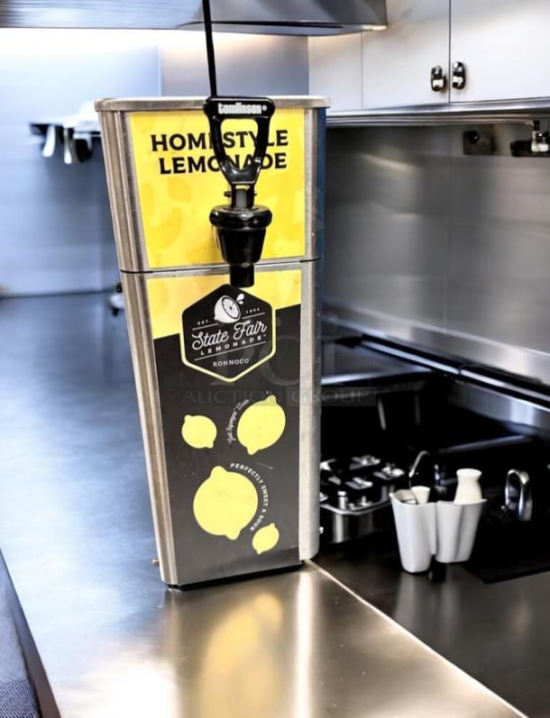 Brand new Ronnoco State Fair Lemonade Dispenser, Model FPM-1 by Newco Enterprises, stainless steel, flawless condition.