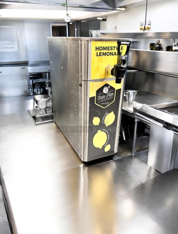 Brand new stainless steel State Fair Lemonade Dispenser, model FPM-1 by Newco Enterprises, featuring Ronnoco branding.