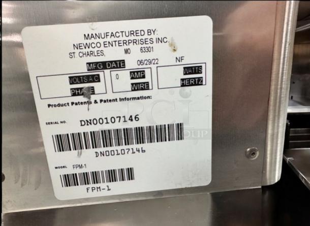 Flawless Ronnoco-branded lemonade dispenser, Newco FPM-1, stainless steel, brand new, with visible label and serial no. DN00107146.