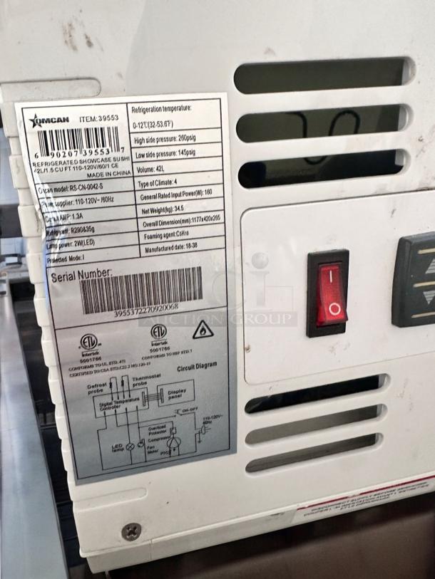 Omcan FPM-1 46" refrigerated sushi display case, model 39553, 110V, outstanding condition, tested & working. Labels display model details and specifications.