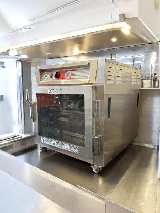 Flawless Metro C563L-SFC-UA Heated Holding Cabinet with full-view door on wheels; fully tested and working condition.