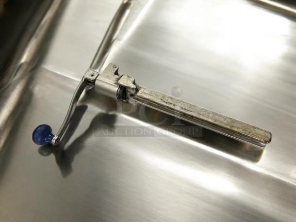Edlund U-12 manual can opener, table-mount, heavy-duty, gear-driven, in superior condition, fully tested and working.