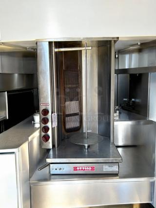 Attias S4Y-4 Gyro Machine, gas vertical broiler in exceptional condition, fully tested, Made in USA, visible controls and Attias branding.