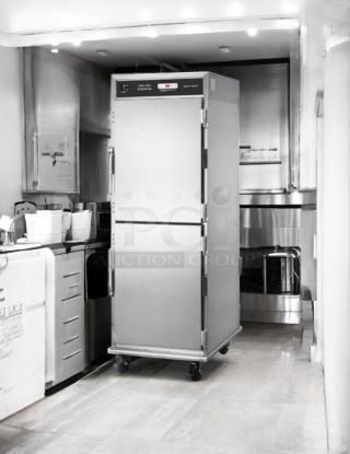 Brand new Henny Penny HHC900.24 full-height heated holding cabinet, solid back, with casters, factory sealed.