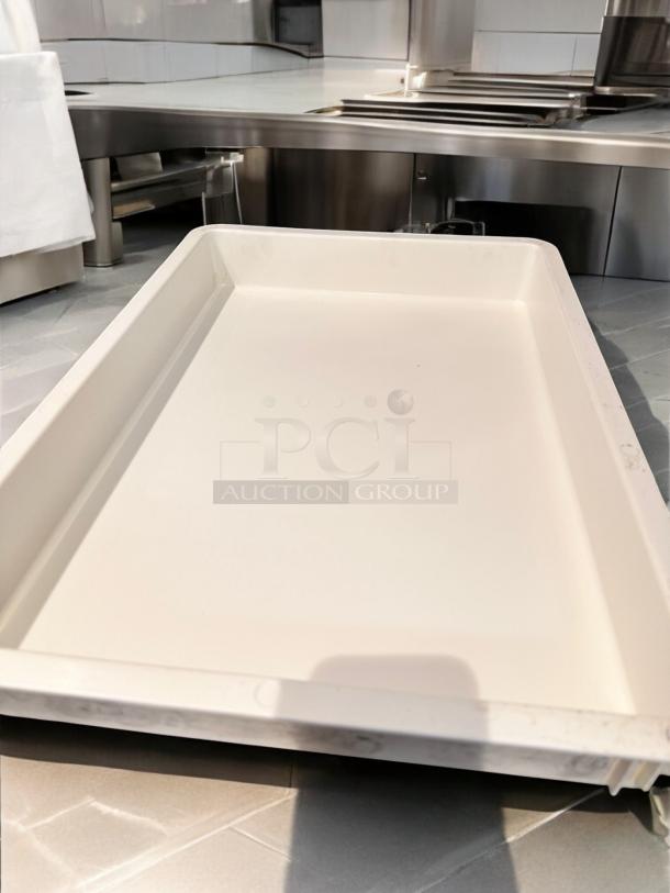 White stackable dough tray in outstanding condition, high-density food-grade plastic, cleaned and ready for use. Quantity: 50.