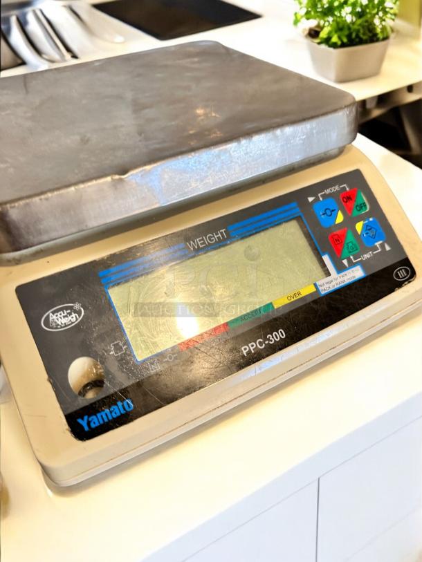 Yamato PPC-300 digital portion control scale in outstanding condition, featuring clear display and control buttons, fully tested.
