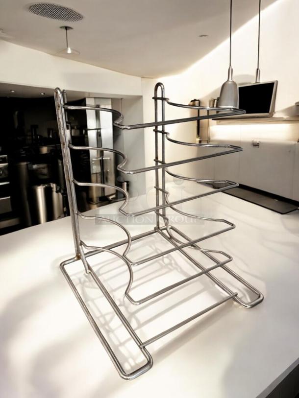 Chrome wire bottle rack, superb condition, holds 6 bottles. Made of chrome-plated steel wire, clean and functional.