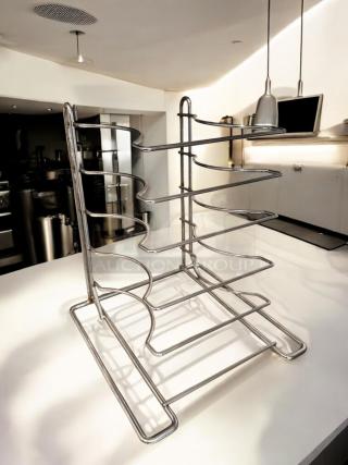 Chrome wire bottle rack, superb condition, holds 6 bottles. Made of chrome-plated steel wire, clean and functional.