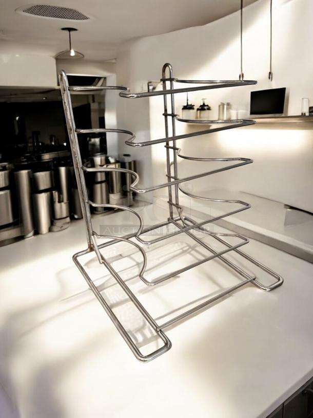 Chrome wire bottle rack, superb condition, holds 6 bottles, made of chrome-plated steel wire, clean and functional.