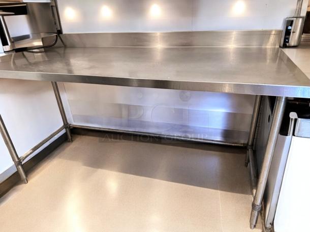 60" stainless steel work table with backsplash, Custom CCommercial Fabrication. Heavy-duty, outstanding condition, fully tested.