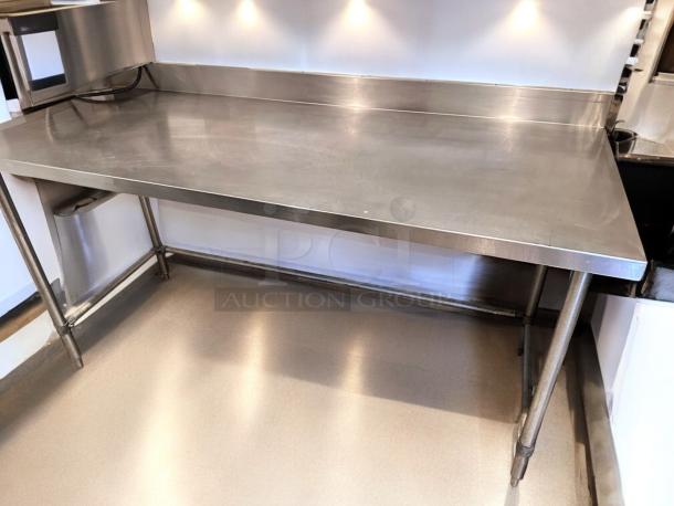 60" stainless steel work table with backsplash, heavy-duty, commercial use, Custom CCommercial Fabrication, outstanding condition.