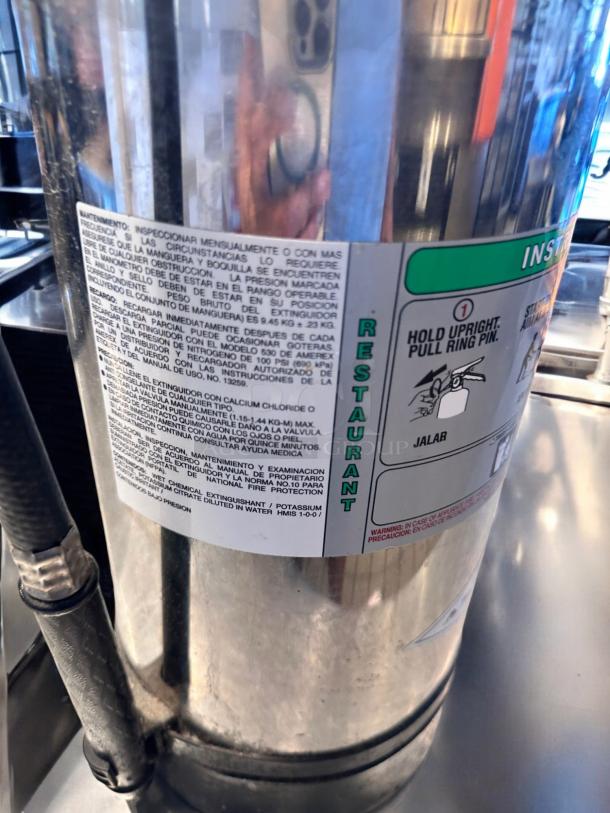 AMEREX K-Class Fire Extinguisher, Stainless Steel, Model 240, top-tier condition, inspected, restaurant use, visible instruction label.