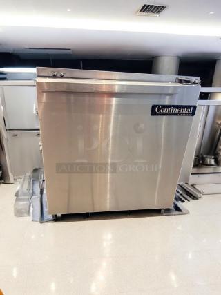 Continental undercounter refrigerator, 1 solid door, stainless steel, outstanding condition, fully tested, logo visible.