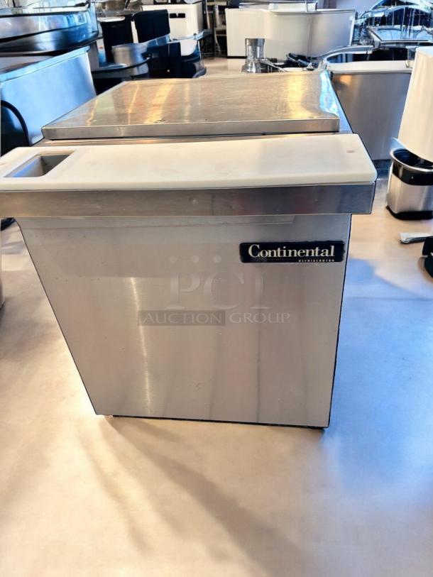 Continental SW27-12M undercounter refrigerator, 27"W, stainless steel, excellent condition, Continental logo visible.