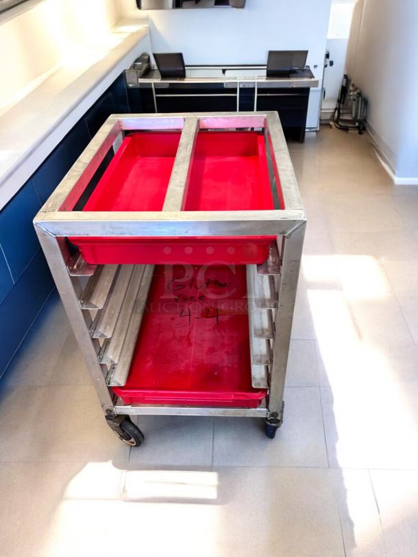 Alexander Industries aluminum pan rack, model 44, 20-tray capacity, excellent condition, NSF certified, with red trays.