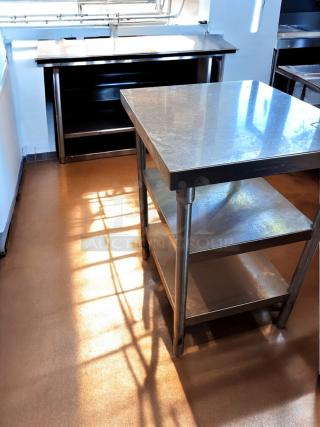 Like-new stainless steel work table, 28" x 28" x 35", with undershelf. Commercial grade, heavy-duty, fully tested and clean.