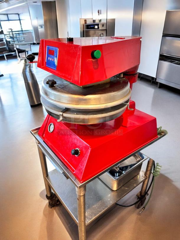 Proluxe DP2300 Pizza Dough Press, excellent condition, red color, 208V, fully tested and working, displayed on metal cart.