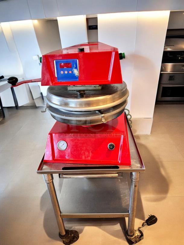 Proluxe DP2300 Pizza Dough Press in excellent condition, 208V, fully tested. Red body, industrial design with visible gauges.