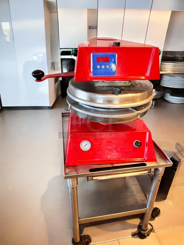 Proluxe DP2300 pizza dough press in excellent condition, 208V, fully tested. Features digital display and manual lever on a red frame.