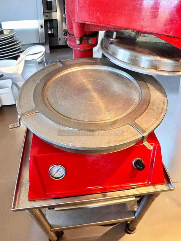 Proluxe DP2300 Pizza Dough Press, excellent condition, 208V, fully tested. Features temperature gauge, red base.