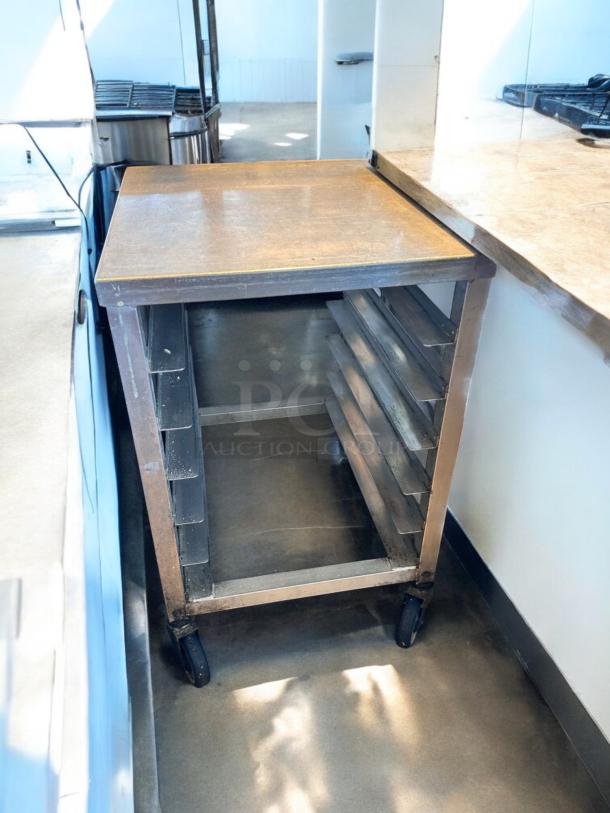 Stainless steel mobile sheet pan rack prep table, 28"W x 23"D x 35"H, superb condition, on wheels, fully tested, commercial use.