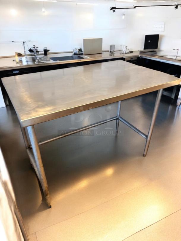 Stainless steel work table, 48"x30"x36", like-new, heavy-duty for commercial prep, fully tested, Custom Commercial model.