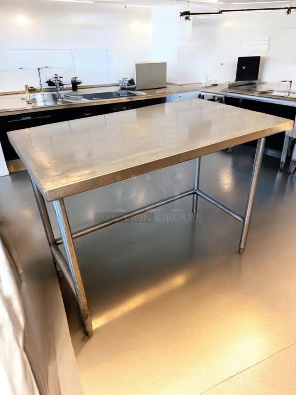 Like-new stainless steel work table, 48"x30"x36", commercial prep use, Custom Commercial model, heavy-duty, fully tested.