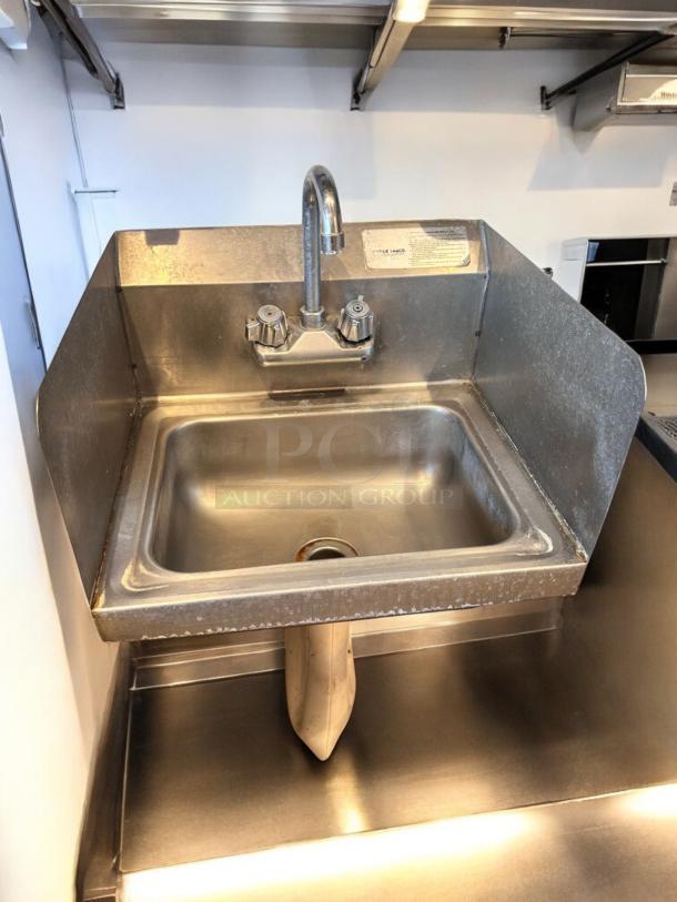 Advance Tabco stainless steel hand sink with faucet, side splashes, and wall mount. Immaculate condition, fully tested.