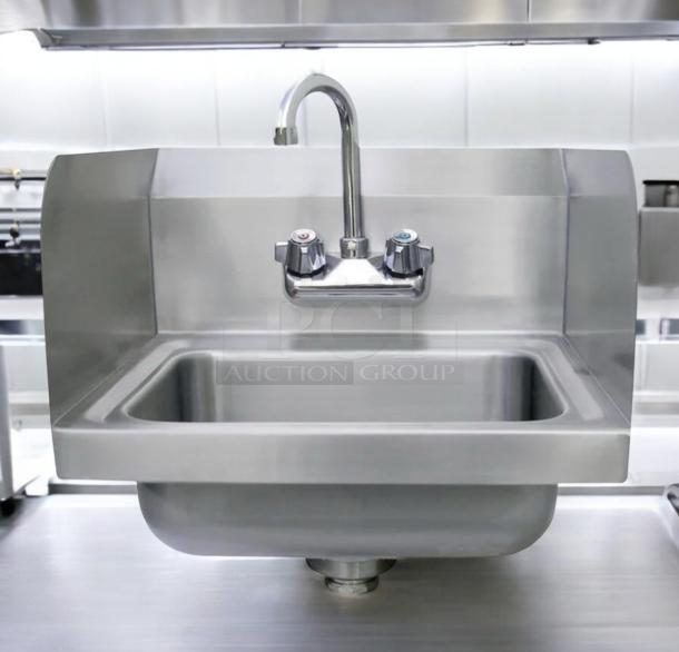 Immaculate Advance Tabco stainless steel hand sink with faucet, side splashes, wall-mount design; fully tested, excellent condition.