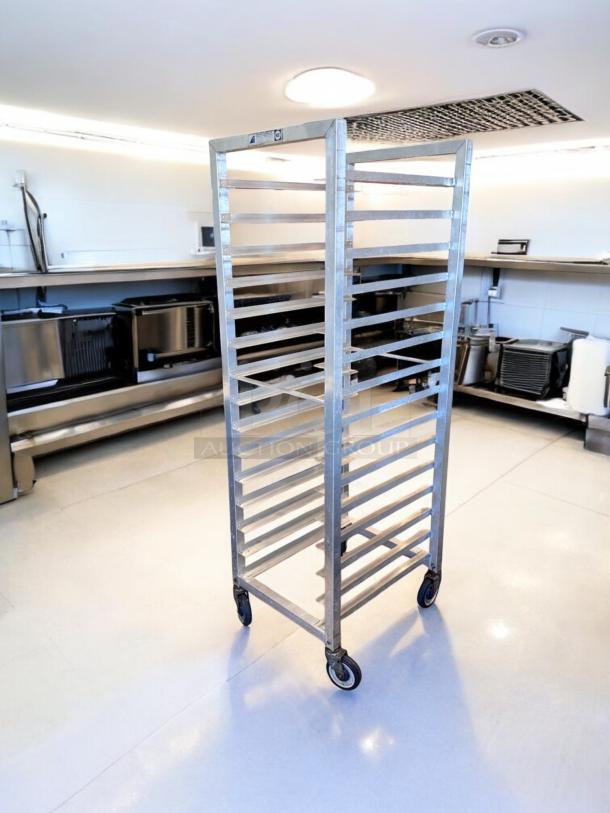 Alexander Industries aluminum sheet pan rack in outstanding condition, 20 pan capacity, fully tested, with swivel casters.