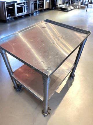 Stainless steel utility prep cart, 23"x18"x34.5", on casters, top-tier condition, fully tested and working.